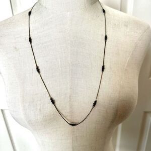 Black and silver tone long beaded necklace